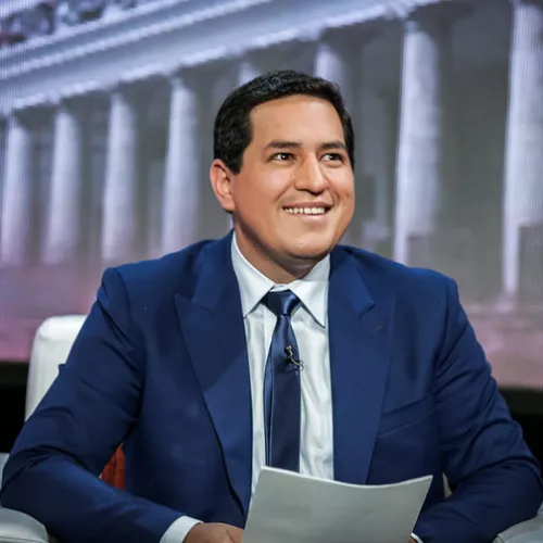 Photo of Andres in a blue suit 