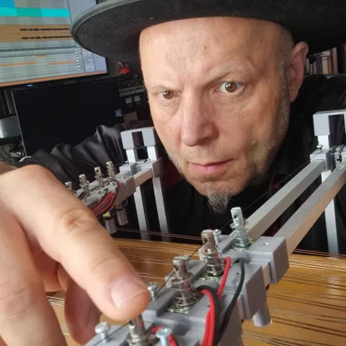 Bruno Kramm works with his solenoid Cimbalom